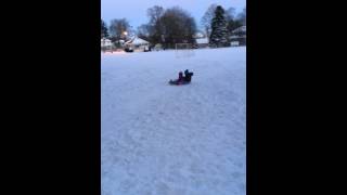 Taryn &amp; Tyce sledding together Stone Park Jan 2014