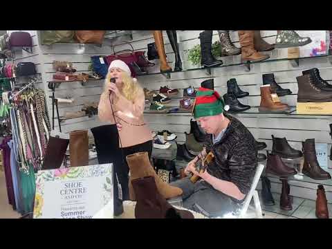 2STRANGE performing in a shoe shop for Christmas! (Watch til the end to see a scared customer flee!)