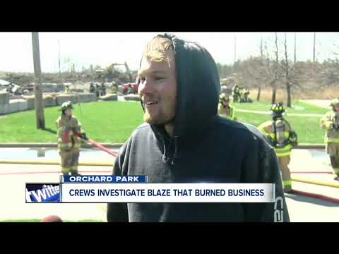 Crews investigate blaze that burned business