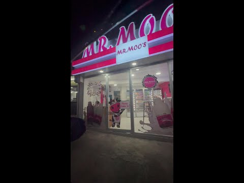 Buying Fresh Milk at the newly renovated Mr. Moo's