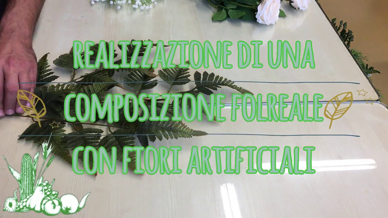 Realizzazione di composizione floreale con fiori artificiali