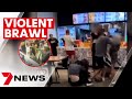 A brawl has erupted inside an Oporto in Brighton Le Sands | 7NEWS