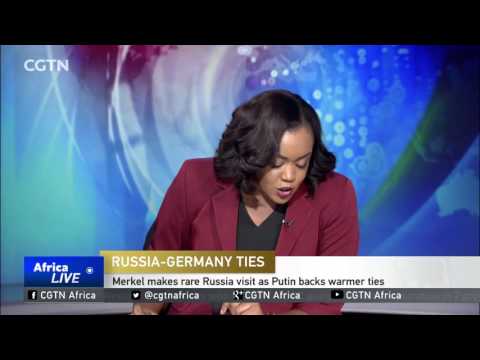 Merkel makes rare Russia visit as Putin backs warmer ties