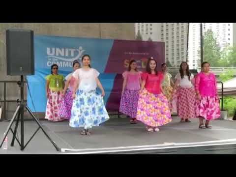 Performing at Unity in the Community folk dance Paru-parong bukid (Butterfly in the field)