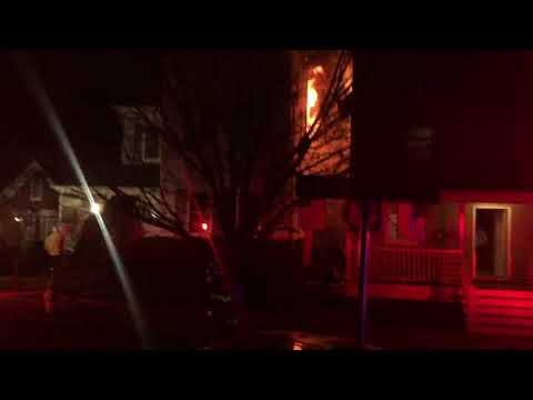 House is on fire Revere MA . Firefighters are on duty.