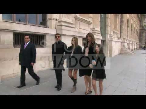 Stallone and family walking in the galleries of the Carrousel du Louvre in Paris