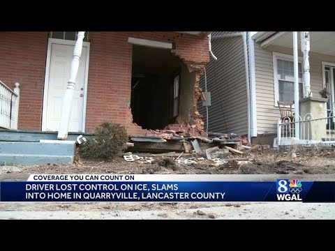 Pickup truck slides on icy road, crashes into house in Lancaster County