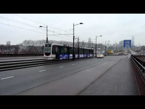 RET tram met reclame wereldopleiding STC, Varkenoords Viaduct, Rotterdam Zuid, 26-1-2012