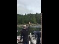 Bald Eagle Grabs Fish From Guy's Hand! (SLOW MOTION)