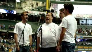 The Rep's Route 66 cast and Lee E. Ernst sing The National Anthem