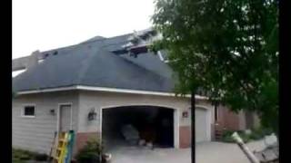 Crane Crushes House