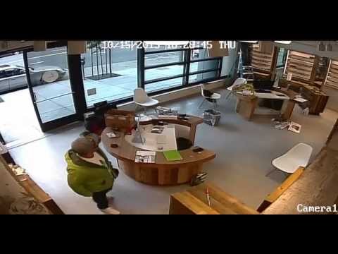 Petty theft caught on camera: guy walks in and casually steals sunglasses