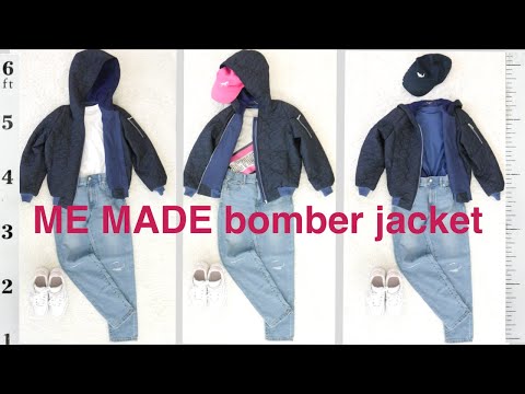 Quilted bomber jacket with hood. Semi raglan sleeve.