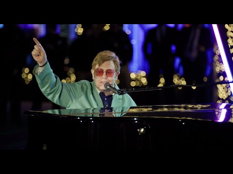 Saks Holiday Window Unveiling and Light Show With Elton John