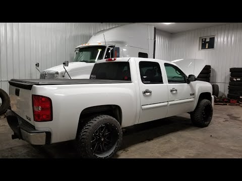 Chevy Silverado. 22x12 Ballistic wheels. 33x12.50 Toyo M/T Open Country tires.