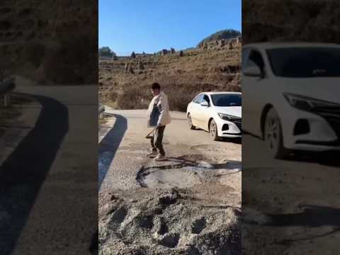 A pothole fixed by a kind-heart man #short,#kindness,#help