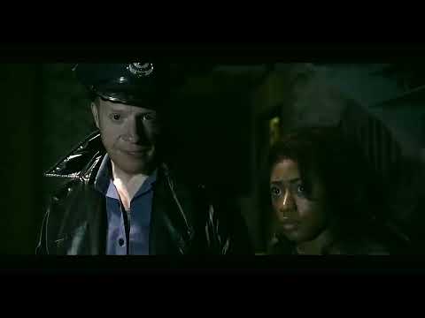 Urinetown trailer still: Officer Lockstock and Little Sally break the fourth wall as the pit band snaps into satire, 2001