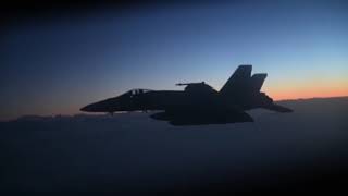 מטוס F-18 "סופר הורנט" בתדלוק אווירי בשמי המזרח התיכון בדרך לתקיפה באיראן.