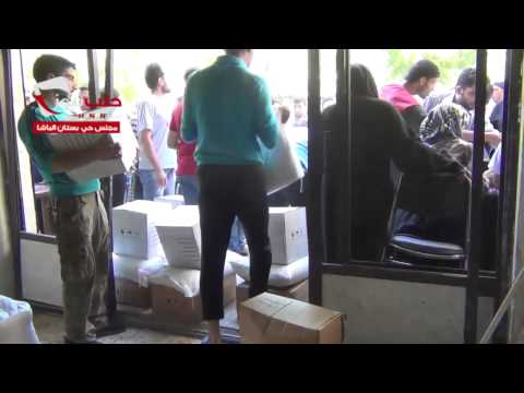 توزيع المعونات الإغاثية في بستان الباشا في محافظة حلب من قبل مجلس محافظة حلب