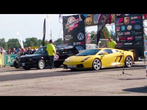 Thumbnail for Lamborghini Gallardo vs '93 GMC Typhoon 1/4 mile drag race