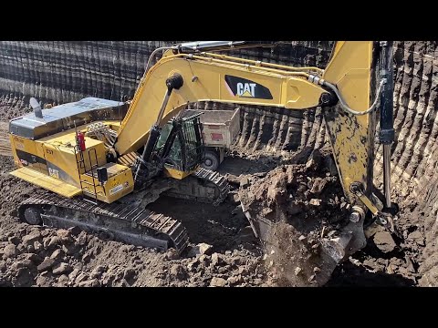 Caterpillar 374D Excavator Loading Mercedes & MAN Trucks - Interkat SA