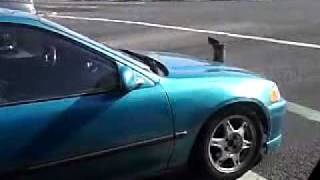 18 Wheeler smoke stack on hood of car