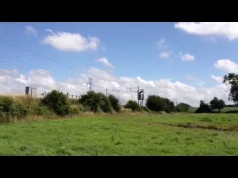 Colas 56105 6C37 Chirk-Carlisle Log empties at Hasty Brow 28th June2013