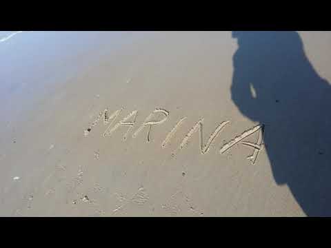 Marina name in beach sand
