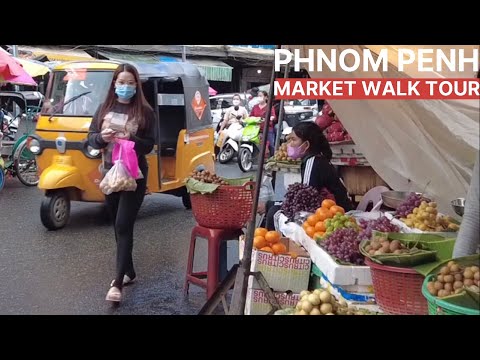 Cambodia tour, travel, walking at lively market in Phnom Penh