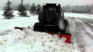 preview picture of video 'Skid Steer Snow Plowing in Kitchener Ontario Canada Snowman.ca'