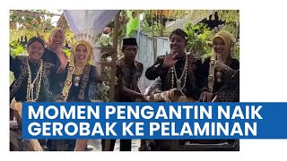 Download lagu Banjir Bukan Halangan, Pasangan Pengantin Ini Naik Gerobak ke Pelaminan, Para Tamu Berjoget mp3
