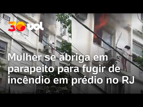 Mulher se abriga em parapeito para fugir de incêndio em prédio no RJ