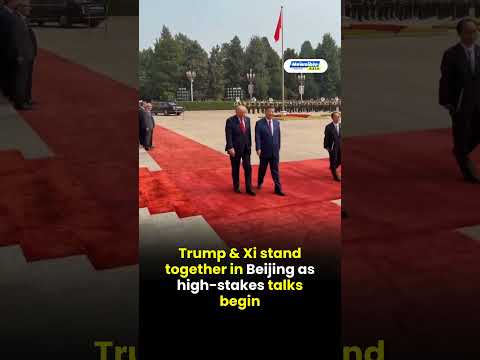 Trump & Xi stand together in Beijing as high stakes talks begin
