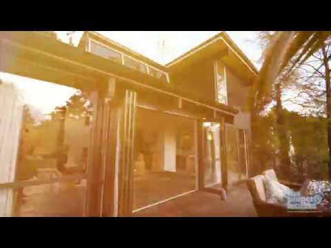 Price by negotiation: 297 Titirangi Road, Titirangi