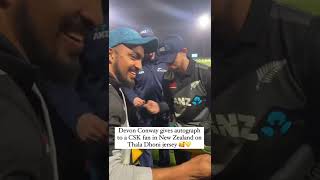 Devon Conway gives autograph to a CSK fan in New Zealand on MS Dhoni's jersey