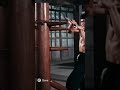 Bruce Lee training with Wing Chun wooden dummy