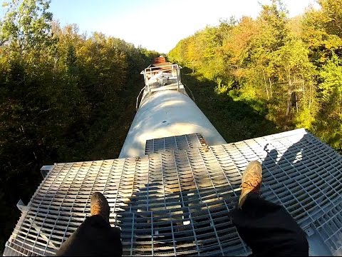 Laid On The Roof Of A Freight Train's Grainer