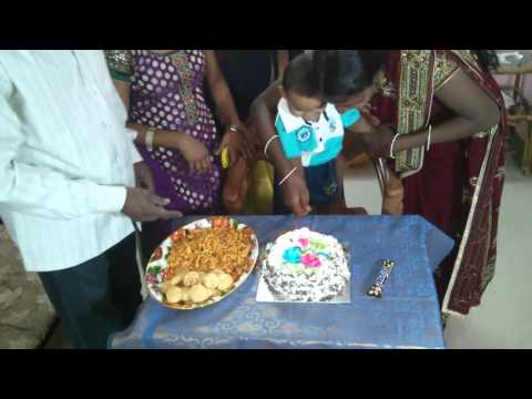 My son's first year birthday cake cutting