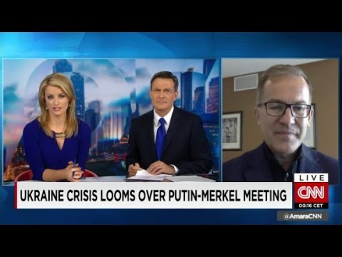 Merkel confronts Putin over violence in Ukraine