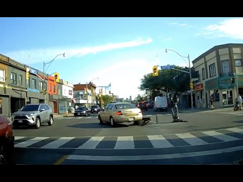 Shocking video shows Toronto driver ramming into, driving over cyclist