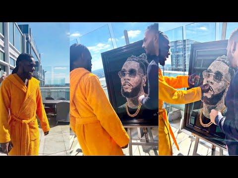 See Burna Boy Priceless Reaction After Fan Gifted Him a Customized Diamond Painting Worth Millions!