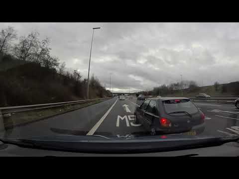 Idiot Changes Lanes Without Looking M6 Southbound M56 Junction