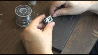 Soldering on a spin proof pinion by Mick A. of Slot Car City