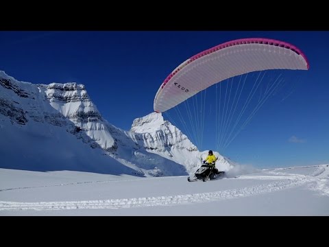 FLYING Snowmobile!! EPIC Snowmobile Paragliding Video