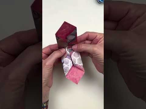 Artist Karen Elaine used our new double sided origami to fold a fun origami pop up box! ✨ #origami