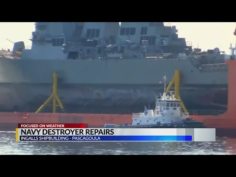 Damaged warship leaves dry dock after 15 months of repairs