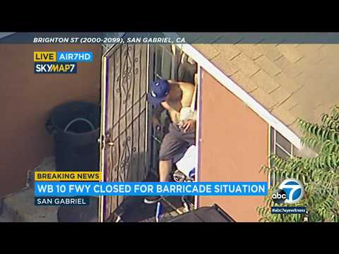 SAN GABRIEL BARRICADE: Armed barricaded suspect hides from officers during dangerous standoff