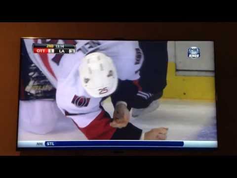 Chris Neil Gets hit in the eye with a puck - Kings V Senators 10/9/13
