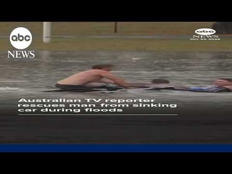 TV reporter pulls man from stranded truck seconds before it sinks