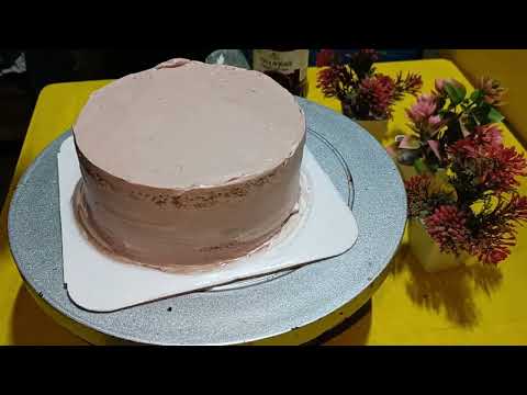 Chocolate cake with golden chocolate ball garnishing ll